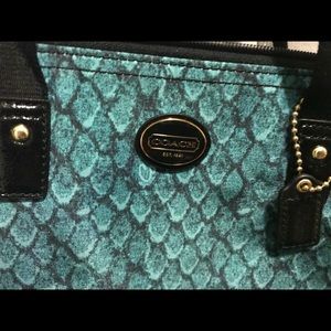 Teal and black coach bag